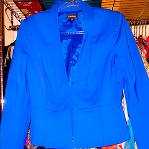 Worn once. Previously dry cleaned. Nice royal blue. Invisible hook closure.